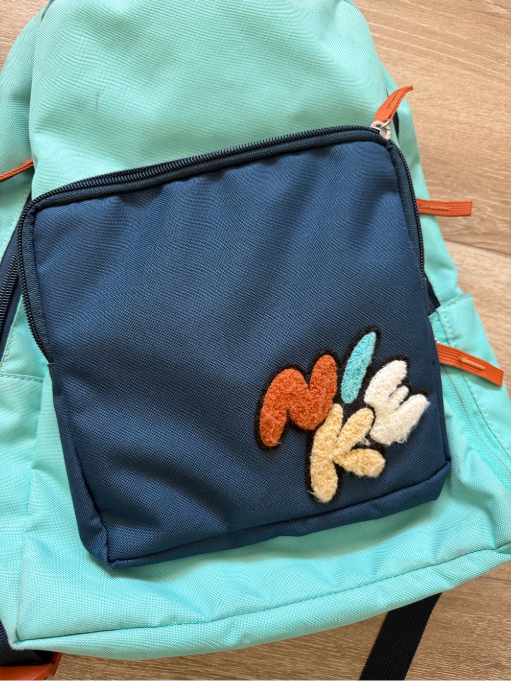 NIKE Kids Mint and Navy Backpack with Colorful Patch